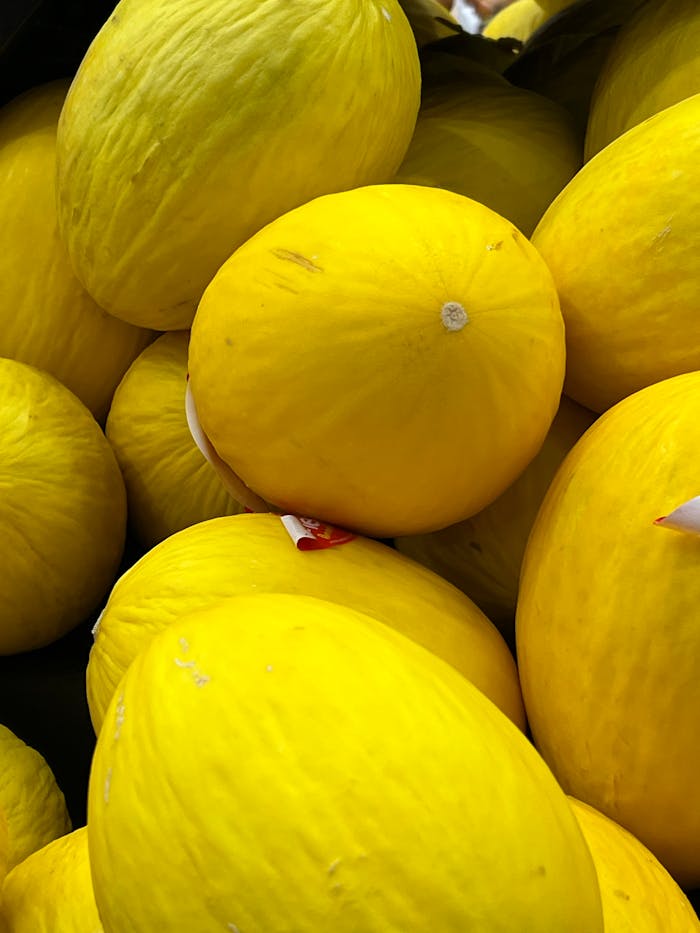 collection-04 bright-yellow-melons-in-a-market-display-34953712